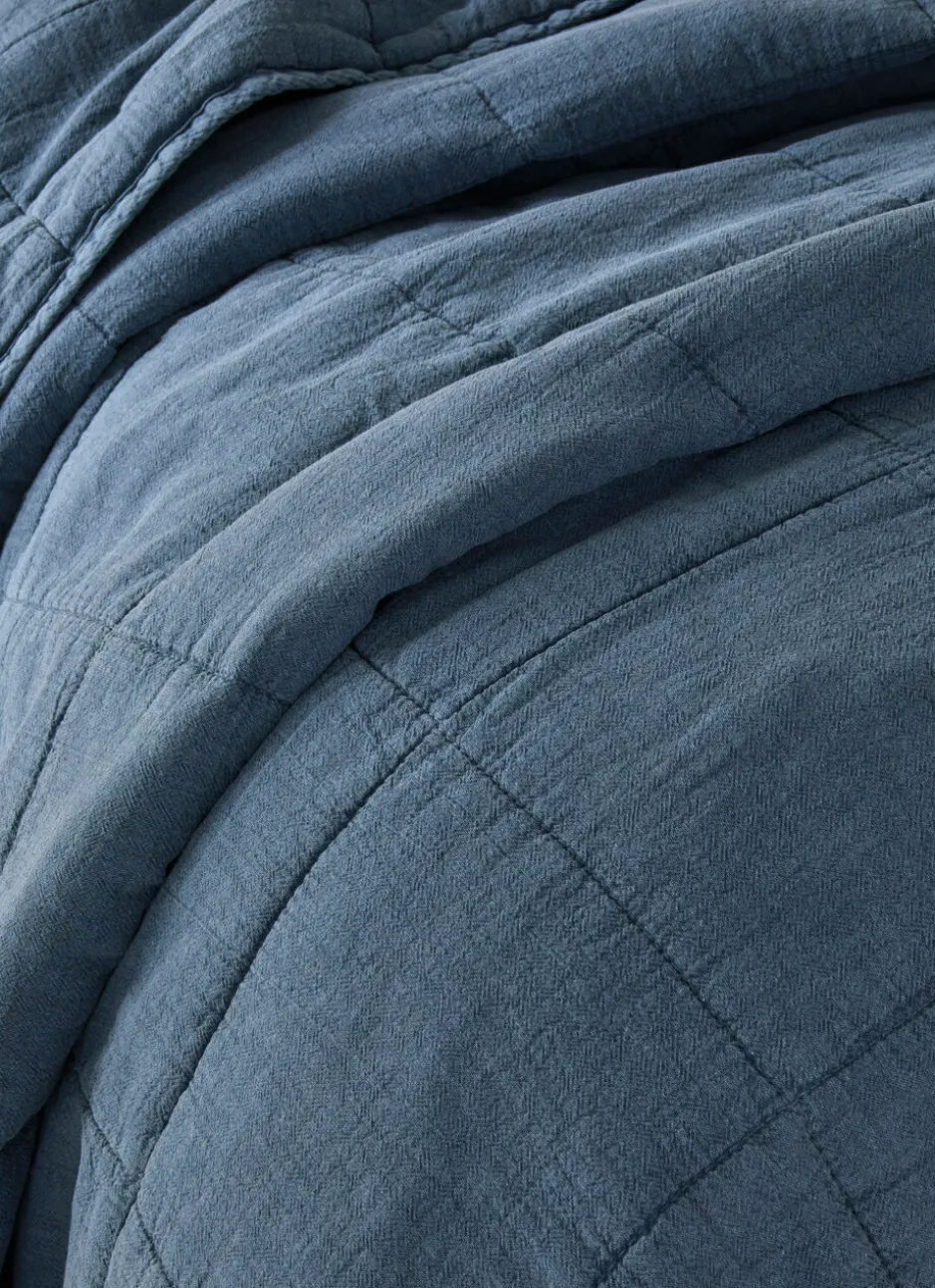 BOUT DE LIT MATELASSÉ UNI BLEU