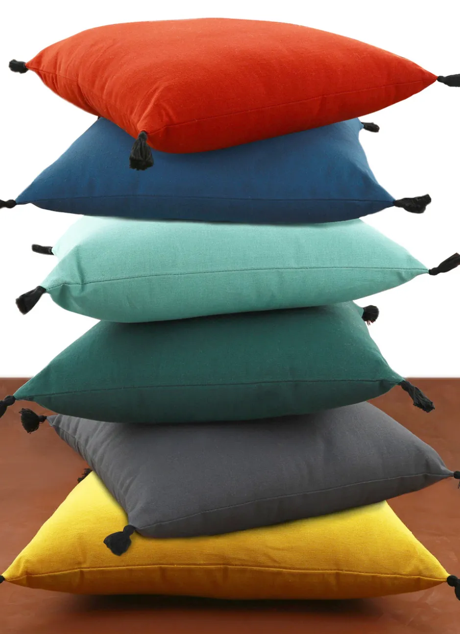 COUSSIN EN COTON UNI AVEC PETITS POMPONS ROUILLE