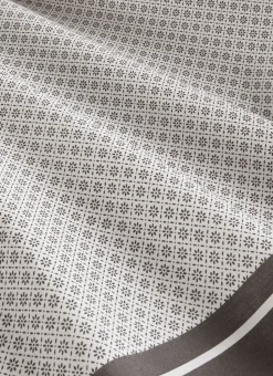 NAPPE EN COTON ENDUITE MOTIF FANTAISIE BLANC/GRIS