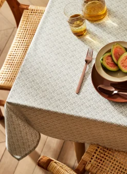 NAPPE RONDE EN COTON ENDUIT IMPRIMÉ PETITES FLEURS BLANC / GRIS