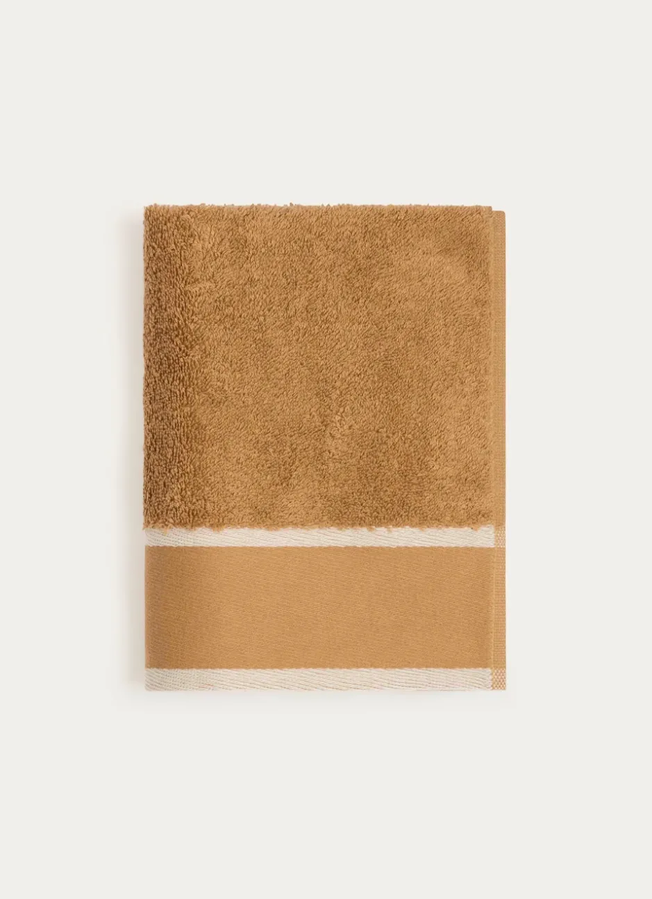 SERVIETTE DE TOILETTE UNIE À LARGE BORDURE ARTHUR CARAMEL