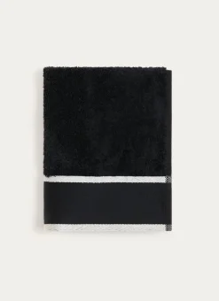 SERVIETTE DE TOILETTE UNIE À LARGE BORDURE ARTHUR Noir
