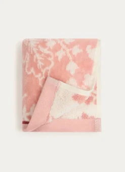 SERVIETTE INVITÉ JADE À GRANDS MOTIFS FLORAUX ROSE CLAIR